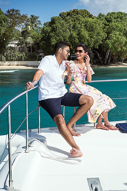 Couple relaxing on a yacht during a Barbados portrait session